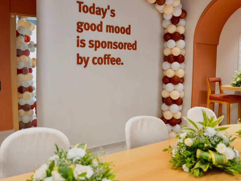 Beautiful lighting and modern decor at Aristo Cafe creating perfect ambiance for dining and relaxation